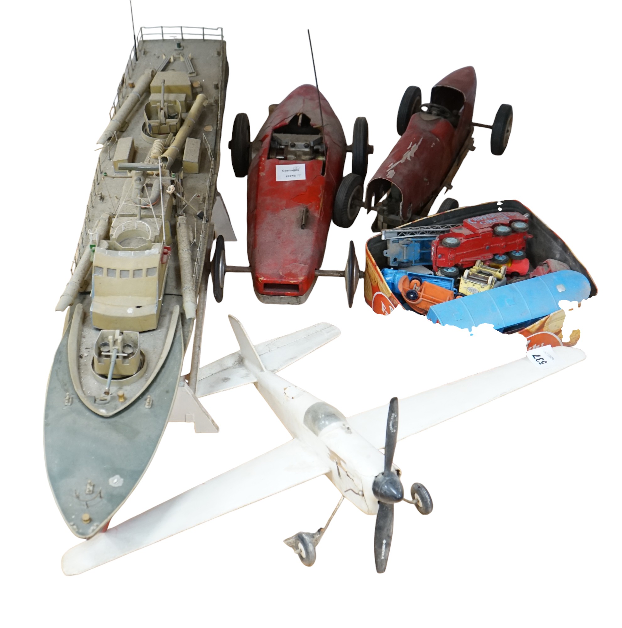 Two tinplate model racing cars, a model aeroplane, battleship and other various cars. Condition - poor